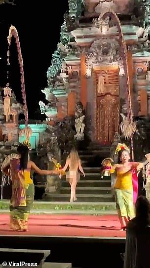 Tourist arrested after stripping NAKED and crashing Bali temple。